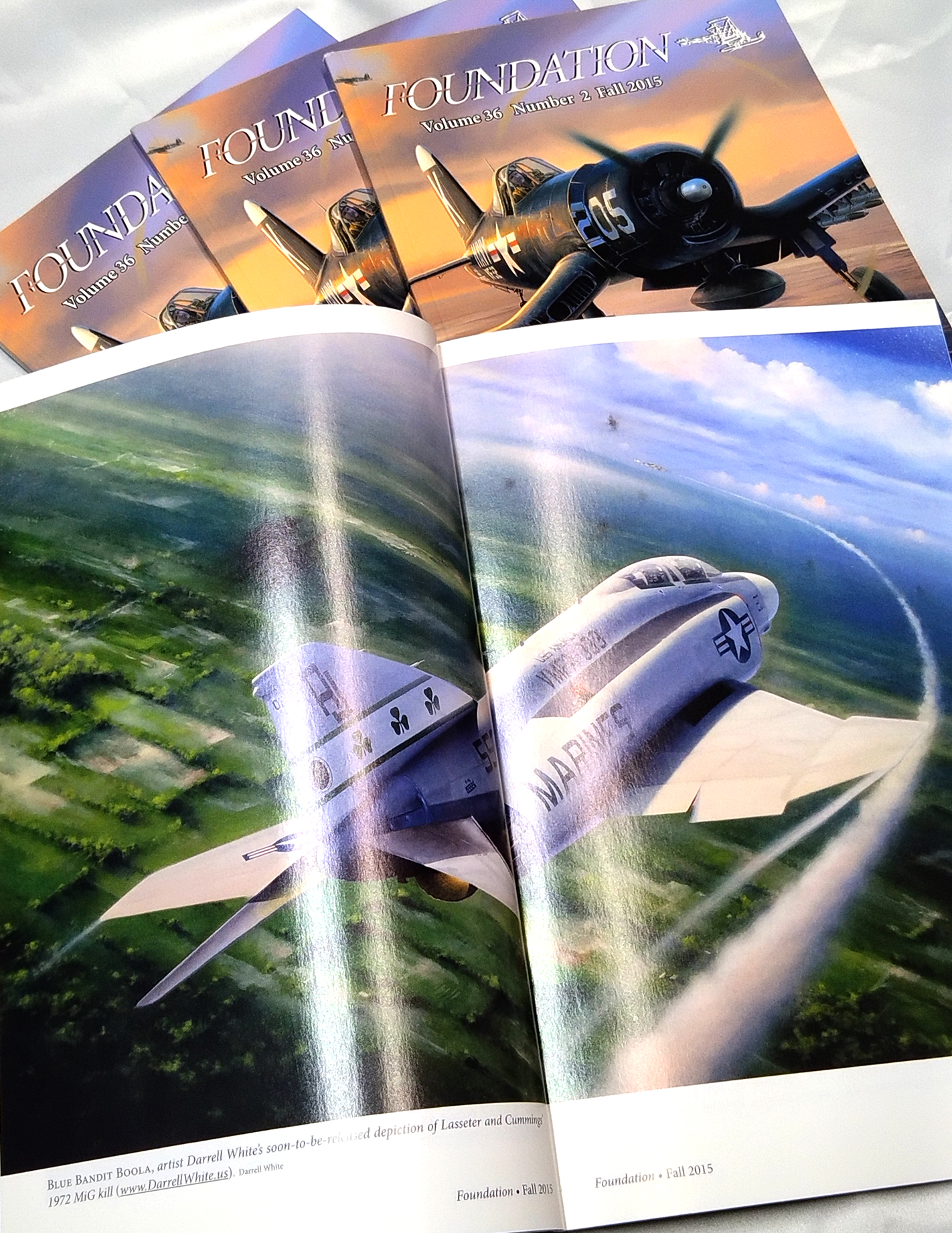 Cover and open two-page spread of Foundation magazine, Fall 2015, featuring Darrell White's painting Blue Bandit Boola